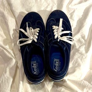 Blue and White Keds sneakers. Lightly worn. No holes, tears, or stains.